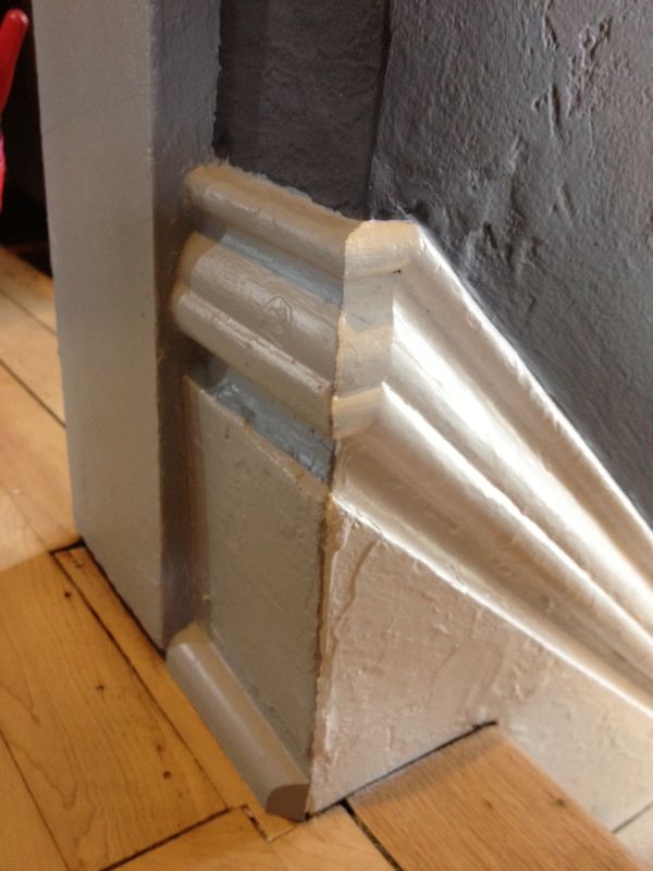Baseboard Transition at the Top of a Stair